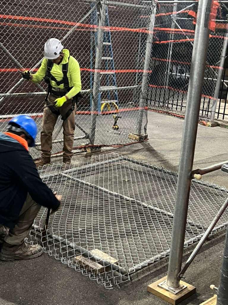 New York City landmark building covered with scaffolding and sidewalk shed